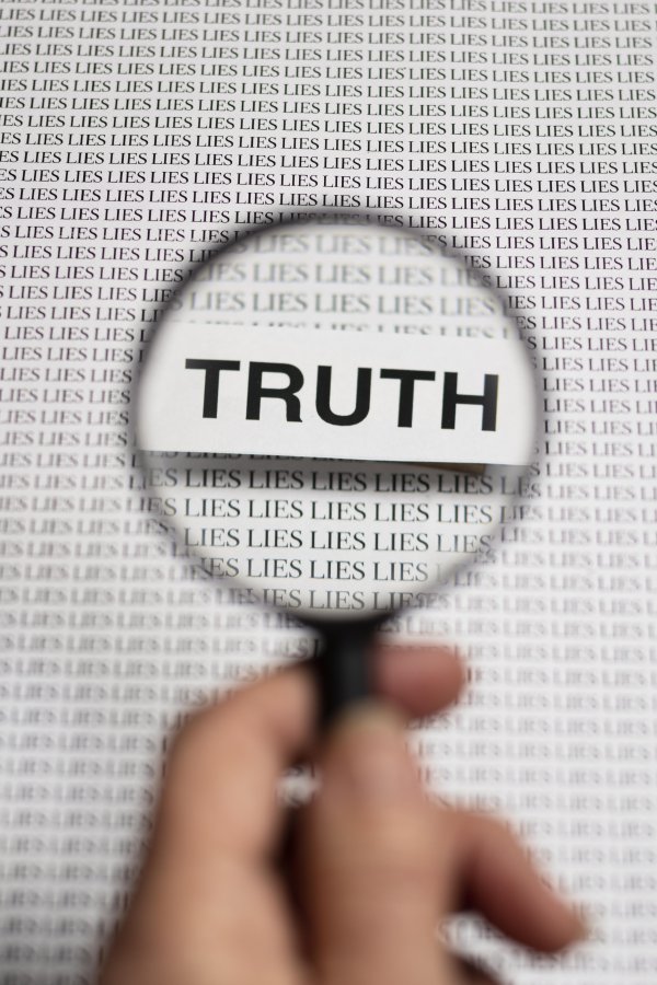 truth-concept-arrangement-with-magnifier